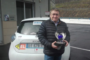 D. Malga et son trophée FIA de champion du Monde en 2019.